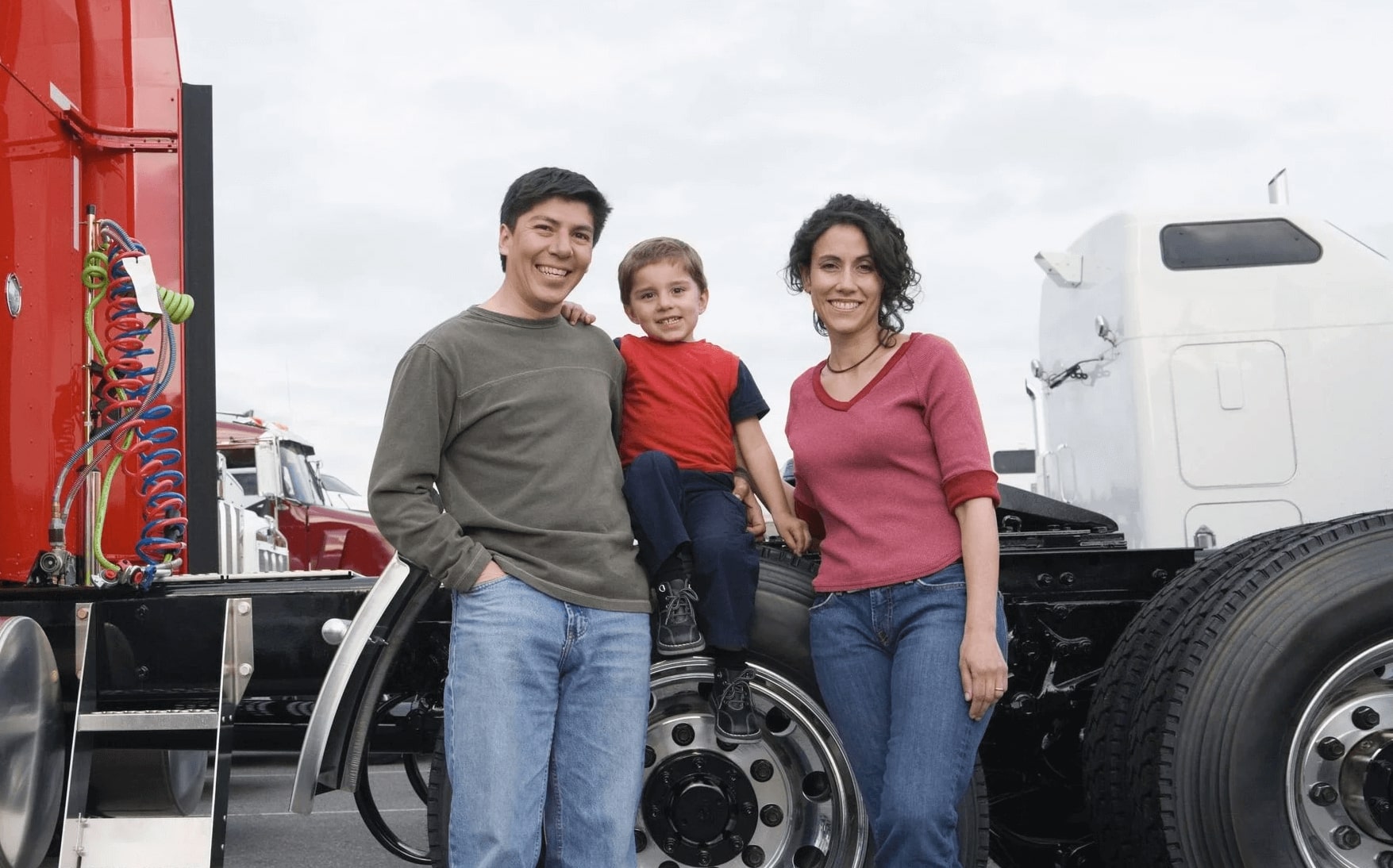 Smiling family poses with MVL Truck Cab